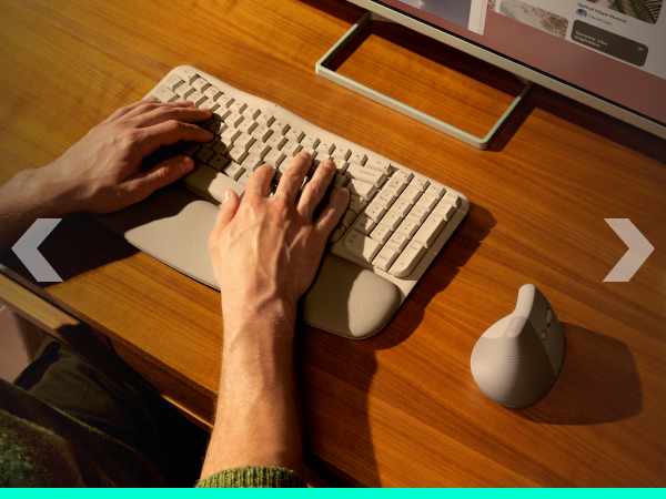 a person using a keyboard and a mouse