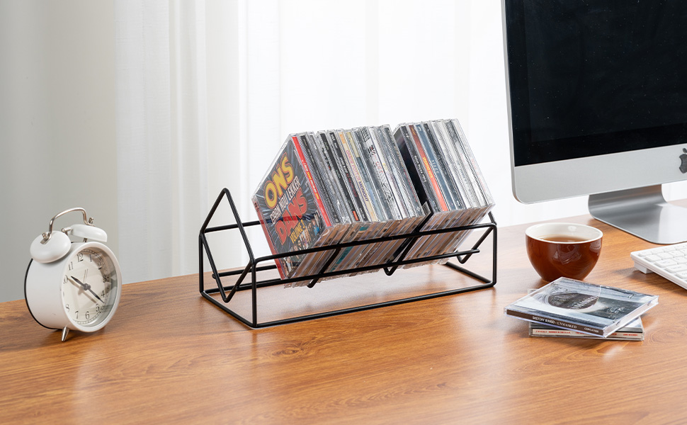matte black metal wire CD case holder organizer rack on a desk