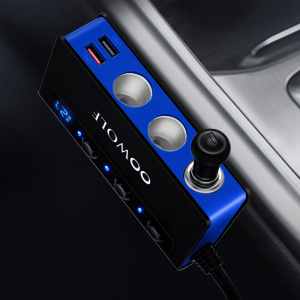 Blue and black car charger with multiple ports, including USB, displayed in a vehicle's center console. Device has 'VOOLOO' branding visible.