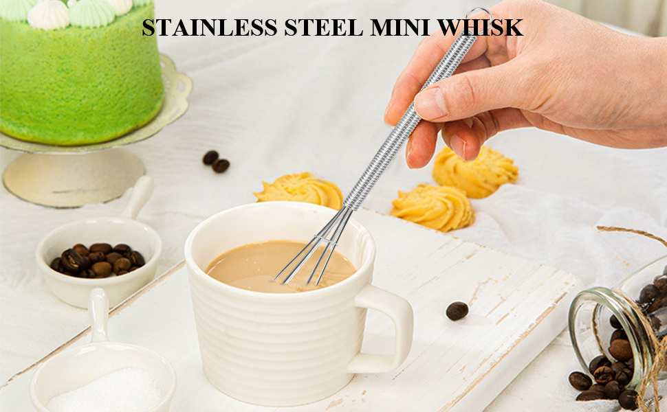 a cup of coffee with a spoon stirring the coffee