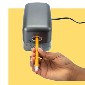 Pencil inserted into School Smart electric sharpener during use.