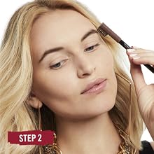 Close-up of woman's face applying Rimmel Professional Eyebrow Pencil with the built-in brush side