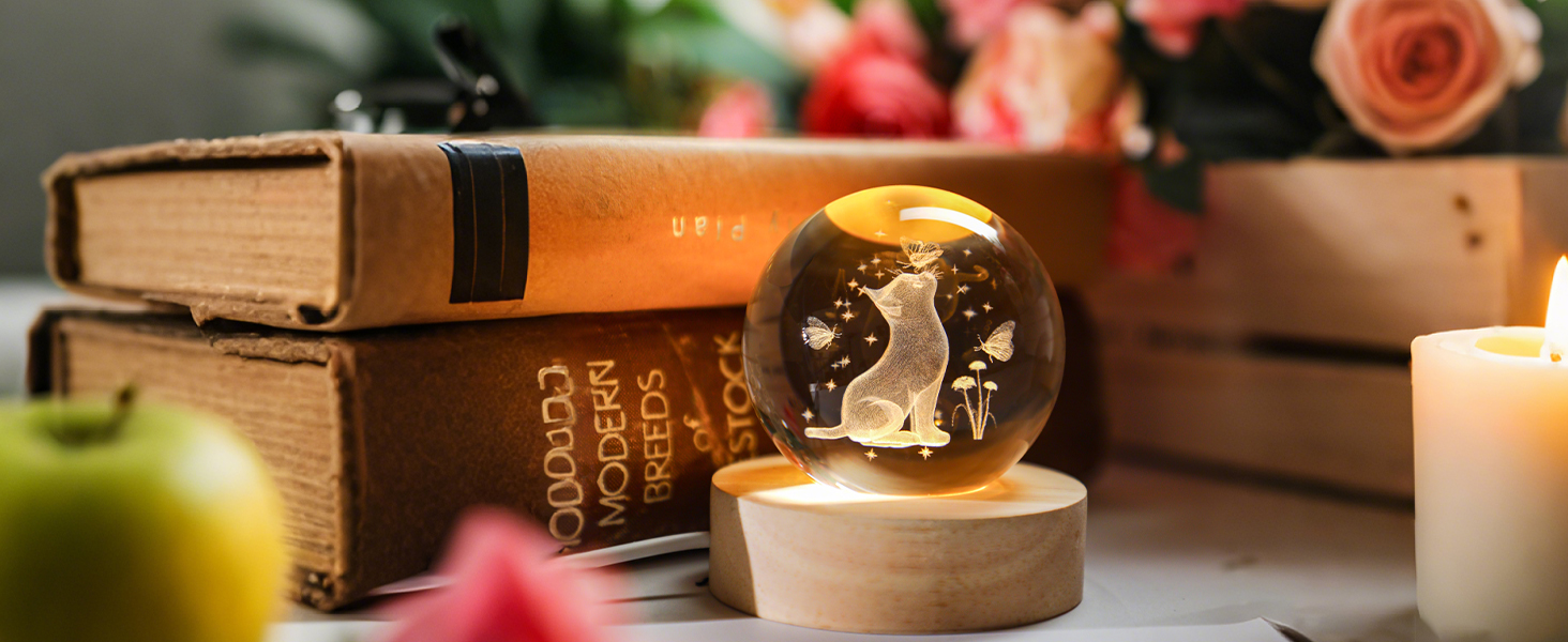2.3IN CRYSTAL BALL FIGURINES