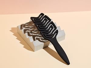 the hair edit massage and detangle hairbrush