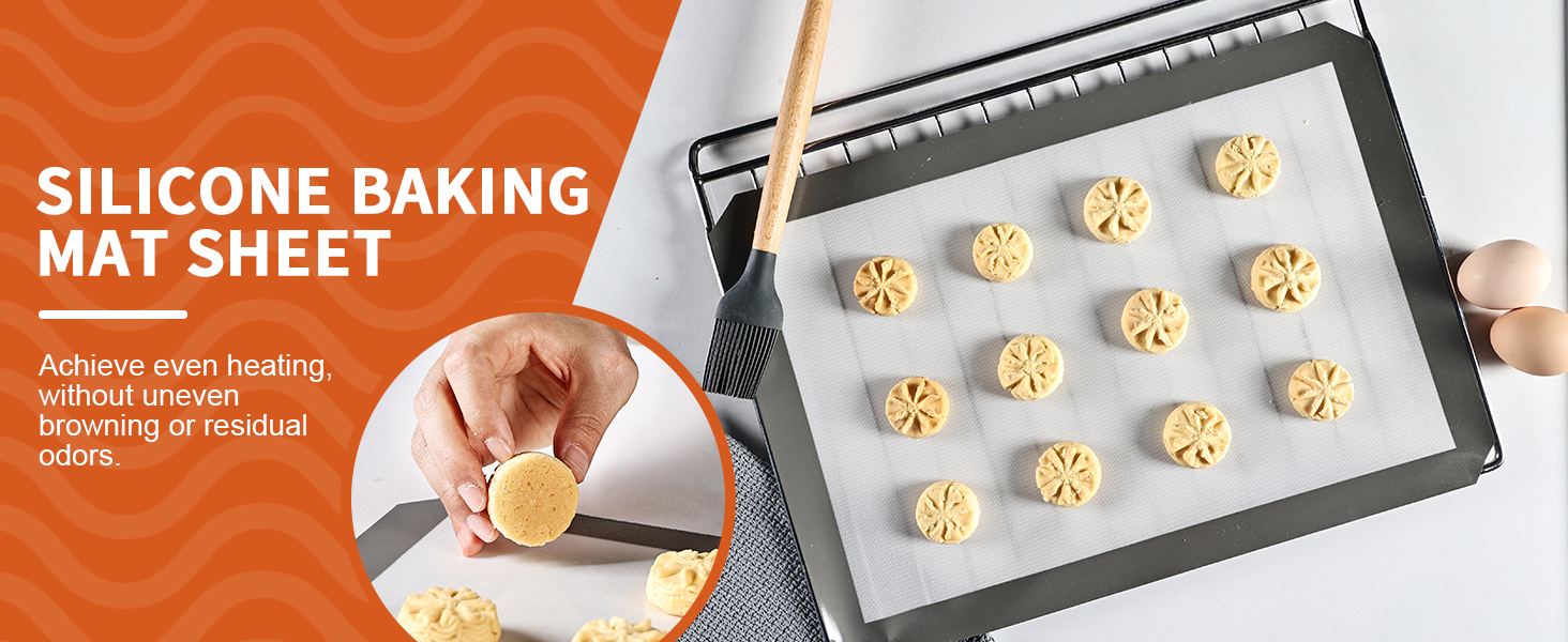 Silicone baking mat sheet shown with small butter cookies arranged in rows, demonstrating non-stick baking surface and even heat distribution capabilities.