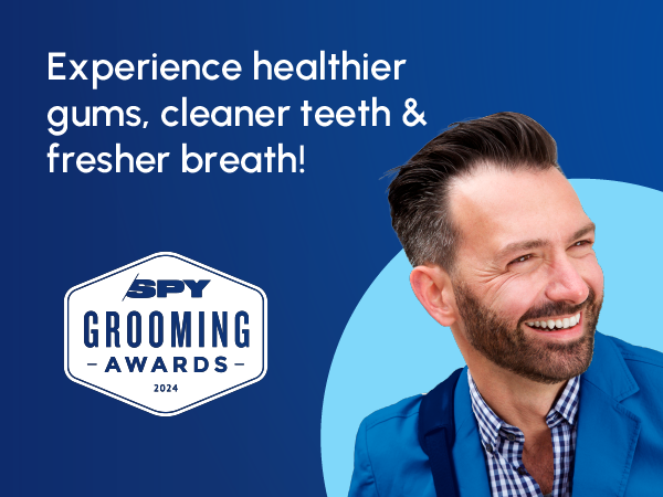 Image of smiling woman with text reading experience healthier gums cleaner teeth and fresher breath.