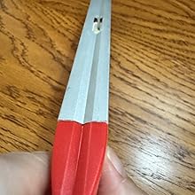 shows a person's hand holdthing the torpedo so the top end is clear - with a full length v-groove