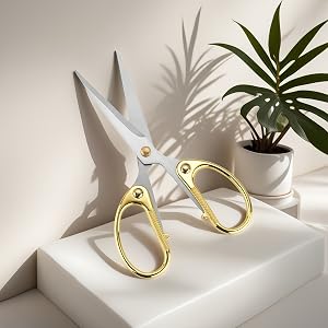 "Effortlessly cuts gift wrap, coupons, tags & fabrics. 1 tool, endless uses."