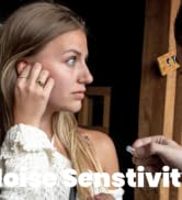 Girl trying on new Earases