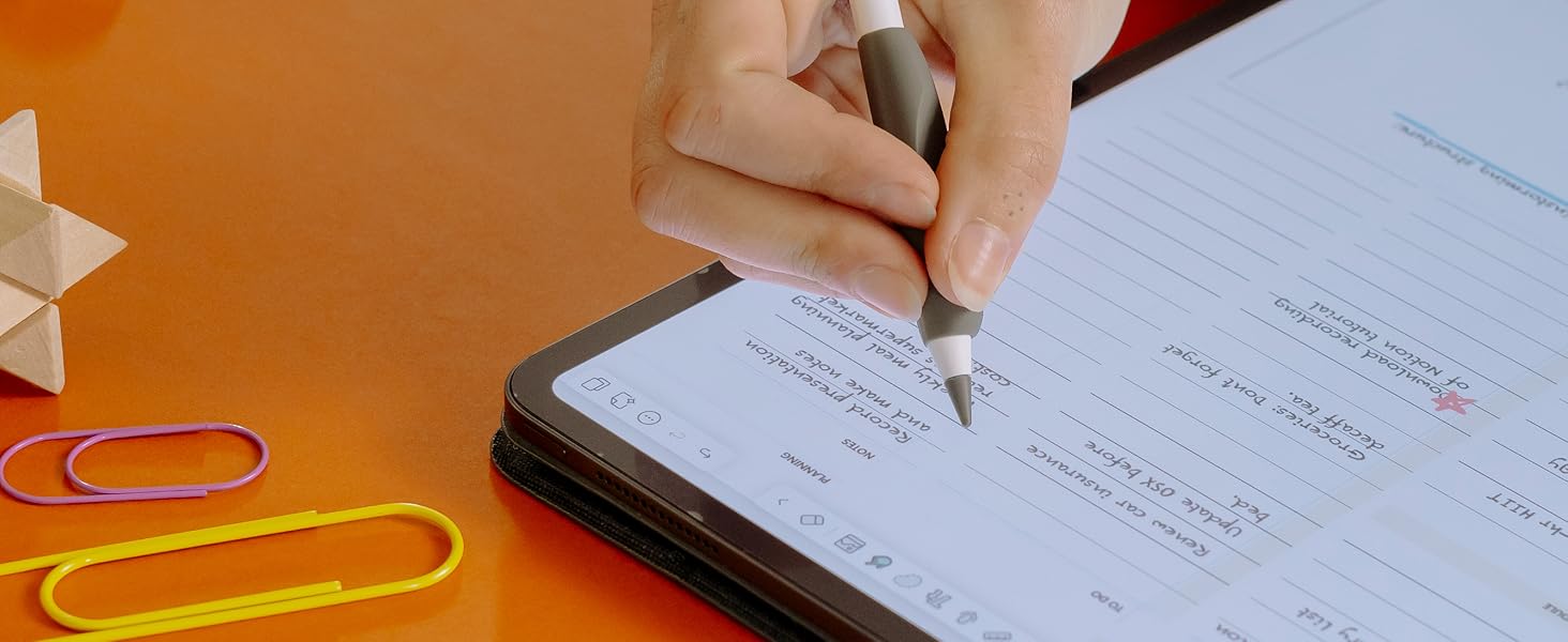 apple pencil is writing on an ipad