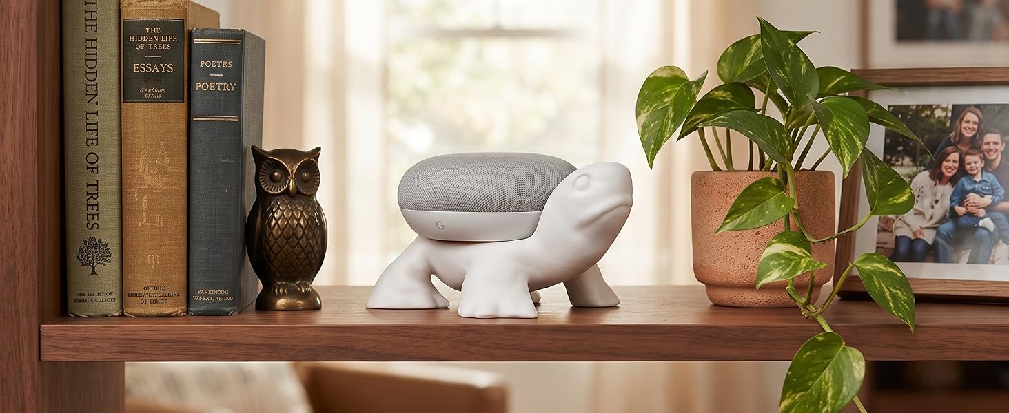 White unicorn Echo Dot holder with pink mane and gold horn in a pastel smart-home setting.