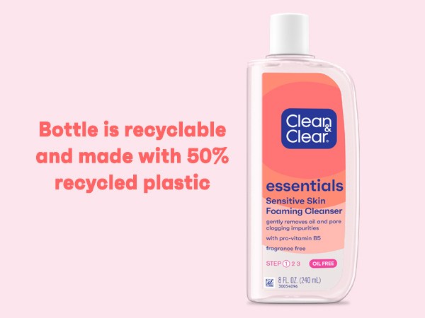 Clean & Clear Essentials Foaming Cleanser on pink background, bottle made from 50% recycled plastic
