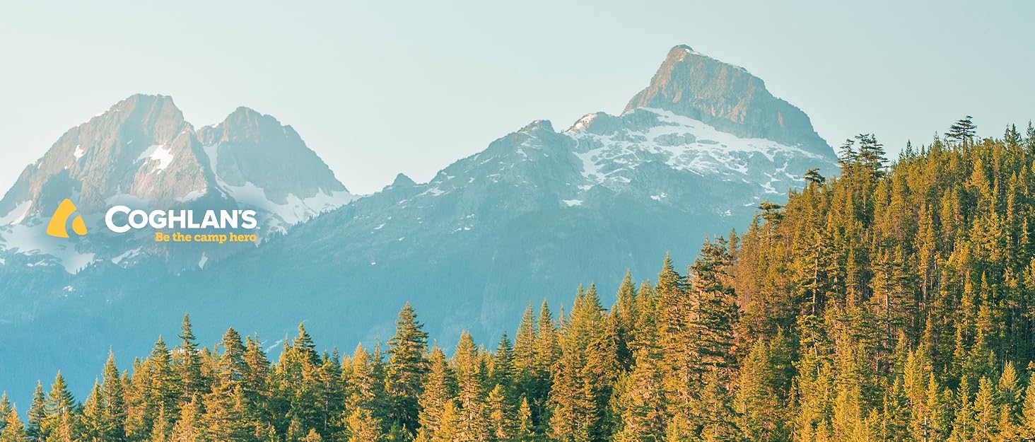 Mountainscape camping background with Coghlan's Logo, with Be the Camp Hero Text