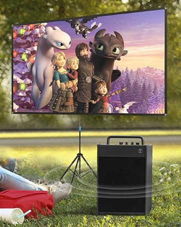 Portable outdoor cinema setup with projector screen showing animated characters, speaker, and couple enjoying movie on blanket in park setting.