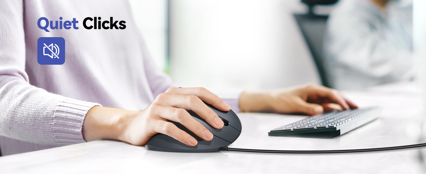Ergonomic wireless mouse being used on desk with 'Quiet Clicks' feature icon, showing silent operation during computer work.