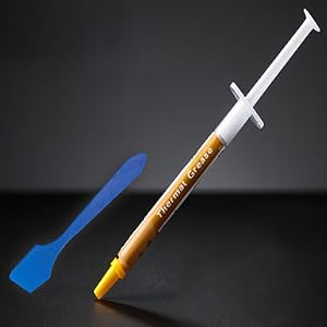 Thermal paste syringe and blue spreader for PC cooling