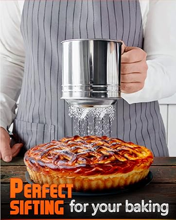 metal sifter sprinkling powdered sugar onto pie for decorative baking finish