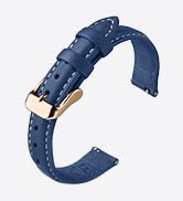 Navy blue cuff bracelet with knotted fabric design and metallic accent detail.
