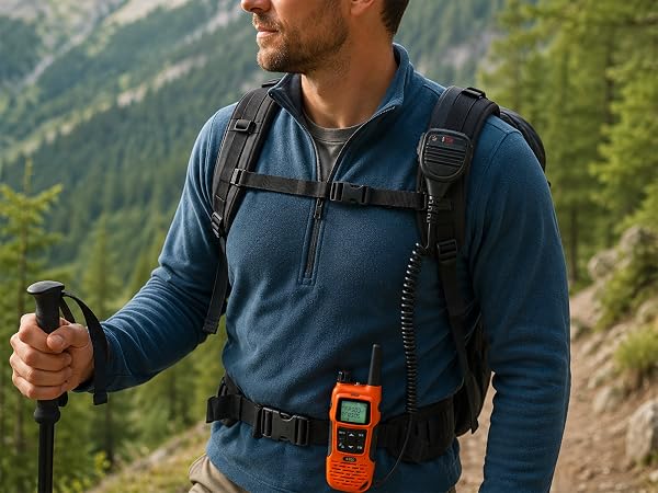 Hiker using FRS-A1 with shoulder speaker mic on mountain trail