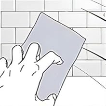 Illustration of a hand using a rectangular tool to apply grout between white tiles on a wall.