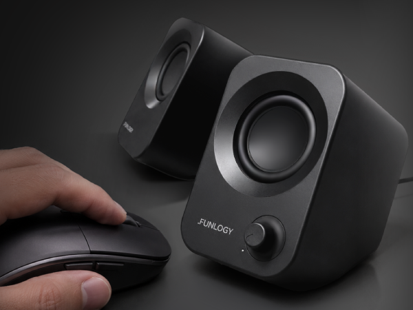 FUNLOGY Speaker Plus compact desktop speakers beside a computer mouse.