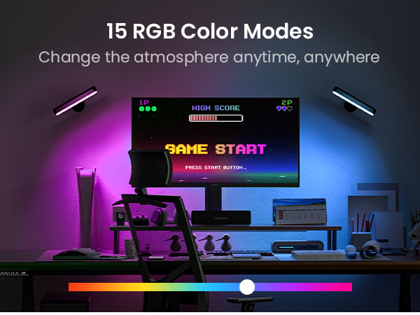 RGB wall lights creating immersive purple atmosphere for gaming room setup and desk decor.