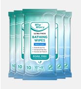 Multiple packages of turquoise-colored wet wipes or cleaning wipes shown from different angles and arrangements.