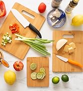 3-piece bamboo cutting board set used for food prep.