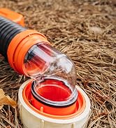 Camco RhinoFLEX rv sewer hose nestled in the Camco sewer hose support kit