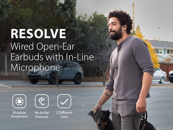 Man wearing Avantree resolve-c while walking dog.