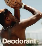 Man smelling deodorant