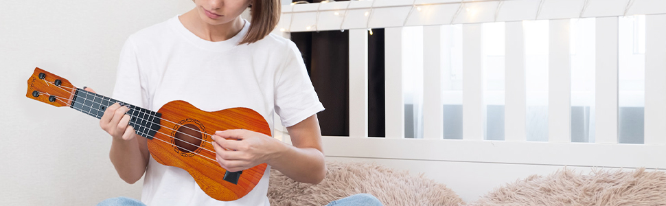 4.Toddlers Ukulele Guitar