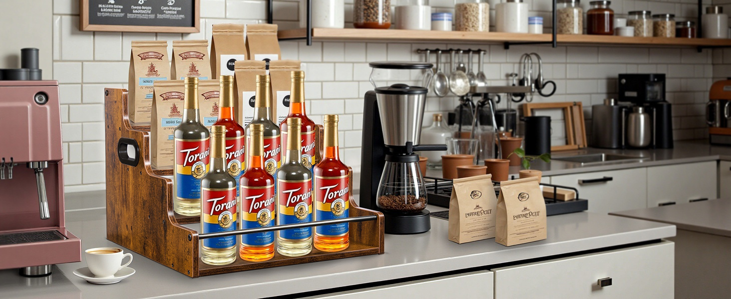 Coffee syrup bottle organizer for home cafe, tiered stand for Torani syrups and accessories.