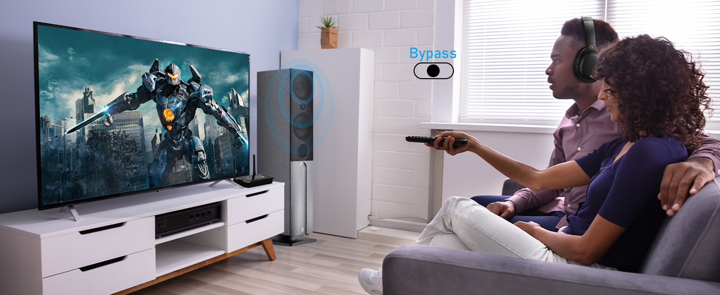 Large flat-screen TV displaying action movie scene.