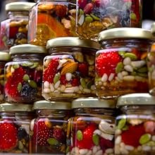 small hexagonal jars filled with preserves