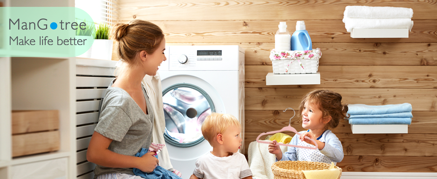 a woman and her children in a laundry room