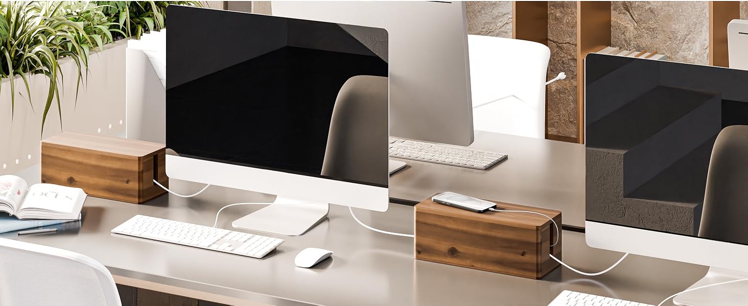 cable box on table between PCs