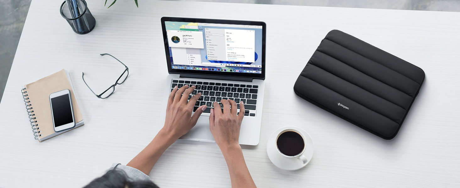 Black puffy laptop sleeve