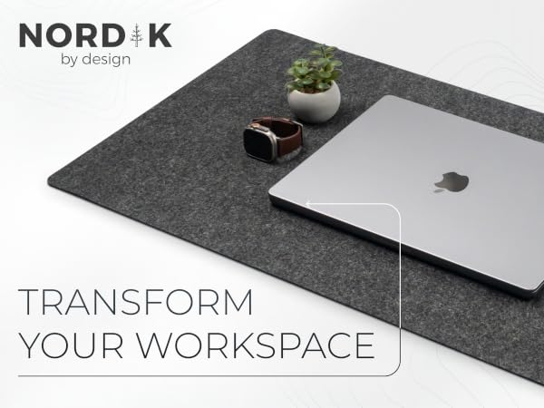 macbook laptop on charcoal felt mat with desk plant - transform your space