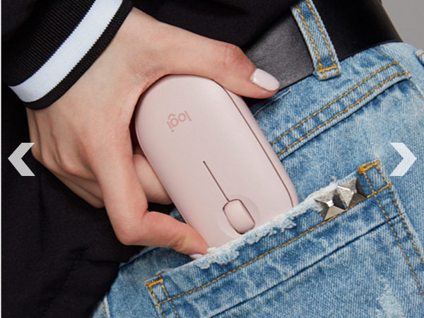 a woman putting m350 rose wireless compact mouse in her pocket