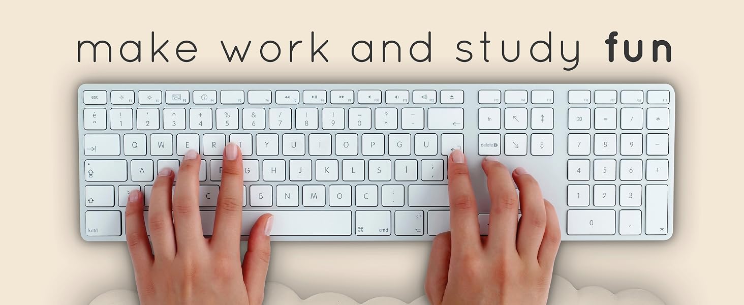 Two hands typing on keyboard with beige cloud wrist rest for computer keyboard