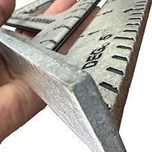 Detailed view of the deep-etched, high-contrast black markings on the Swanson Speed Square Pro
