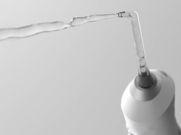 water flosser spraying