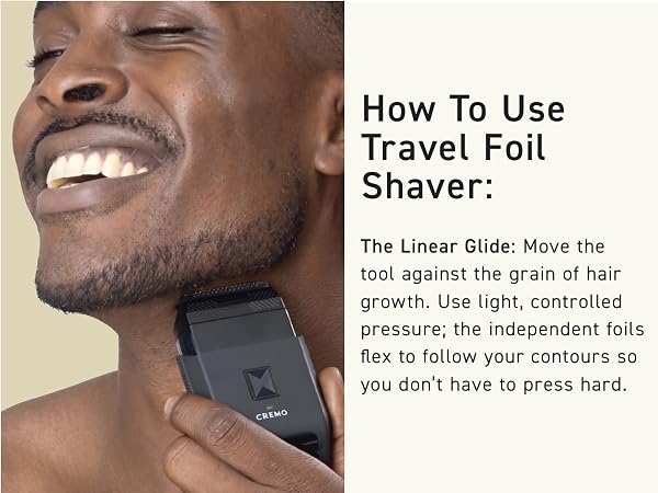 Step 1: Shave against hair growth with the Cremo Travel Foil Shaver