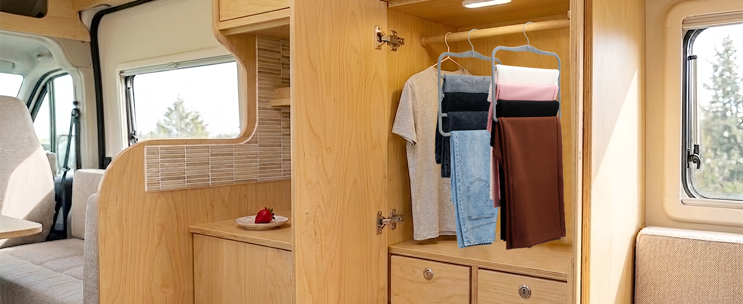 pants hangers organizing jeans in compact RV camper closet for travel living essentials