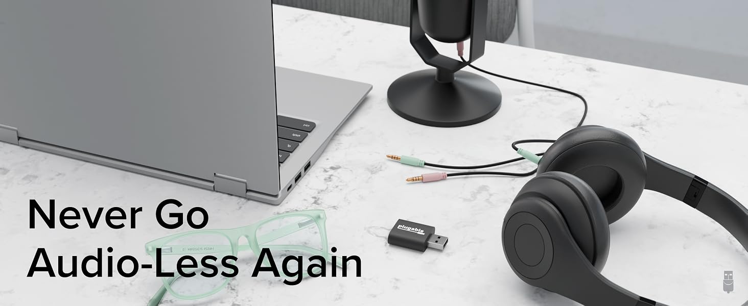 Plugable USB Audio Adapter featuring a 3.5mm speaker/headphone jack and microphone jack.