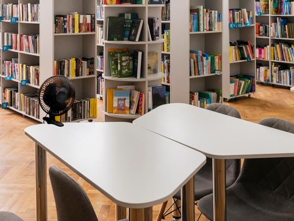 Plug-in clip-on fan with adjustable head for targeted airflow in small spaces like bedrooms