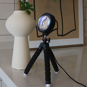 a tripod with a camera on it