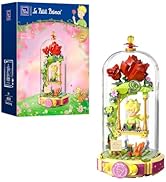Product display of a children's toy featuring a colorful castle or palace design with fantasy elements. Multiple views show different angles of the same decorative play structure.