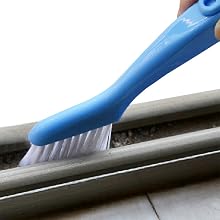 Groove cleaning brush